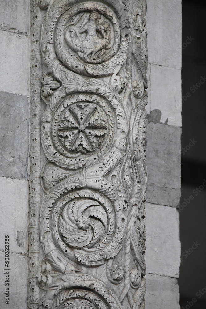  Lucca - detail from St Martin's Cathedral facade. Tuscany
