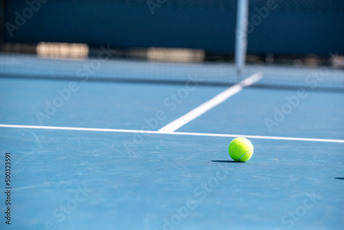 Tennis ball on empty court