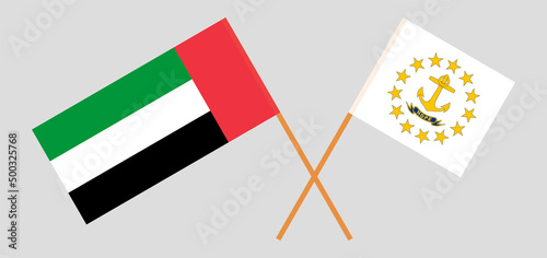 Crossed flags of the United Arab Emirates and the State of Rhode Island. Official colors. Correct proportion