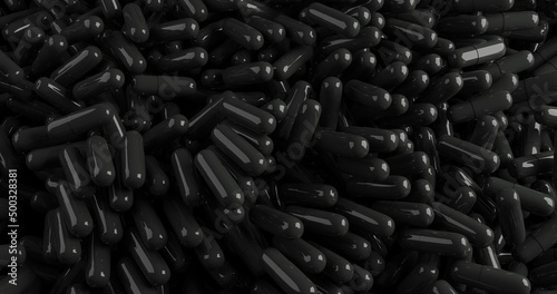 close up of a pile of black pills