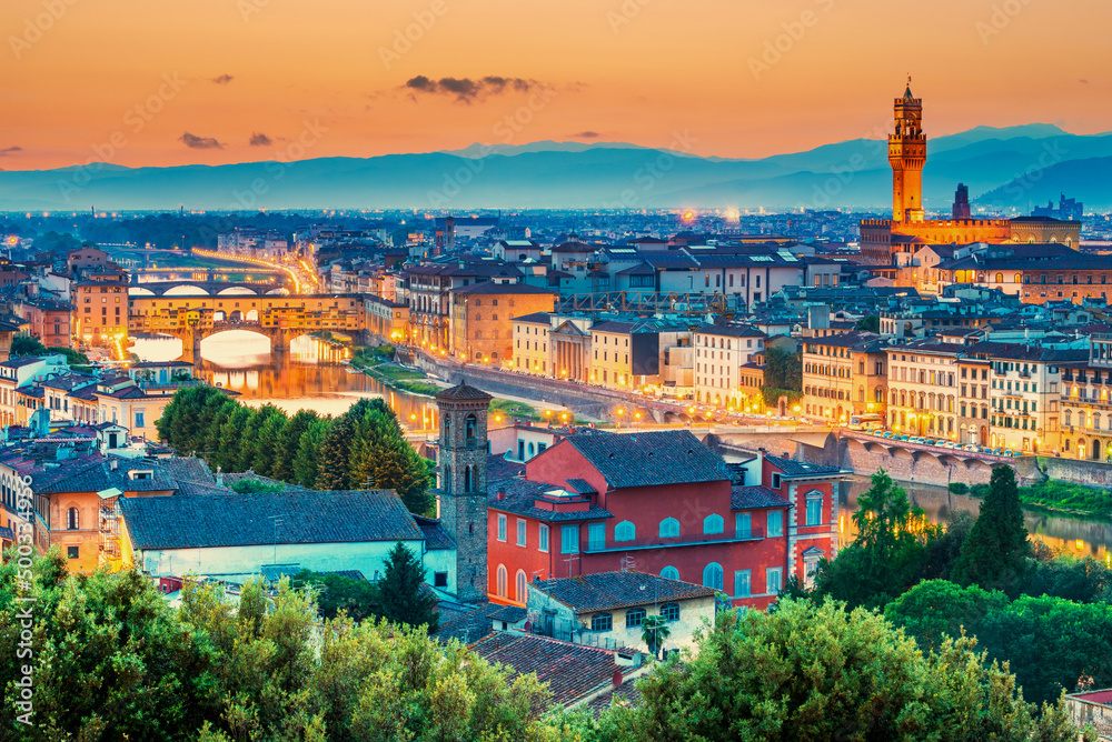 Tuscany, Italy - Florence skyline with Arno River, Ponte Vecchio and Palazzo Vecchio
