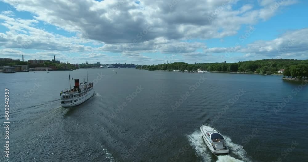Aerial Forward Scenic Shot Of Motorboats Moving On Sea Water - Stockholm, Sweden Aerial Forward Scenic Shot Of Motorboats Moving On Sea Water - Stockholm, Sweden