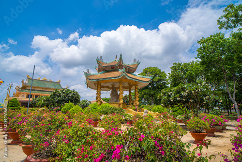 Buddhist Temple in Vietnam - Dai Tong Lam. Beautiful Architecture presbytery temple Dai Tong Lam with so many cloud, which attracts tourists to visit spiritually on weekends in Vung Tau, Vietnam photo