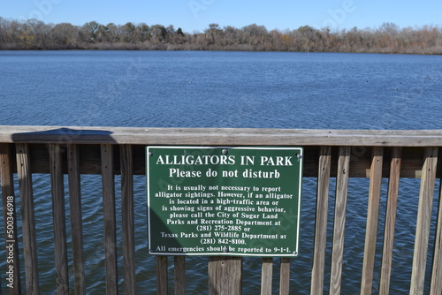 Safety sign on the fishing pier, White Lake, Cullinan Park Conservatory, Sugar Land, Texas photo