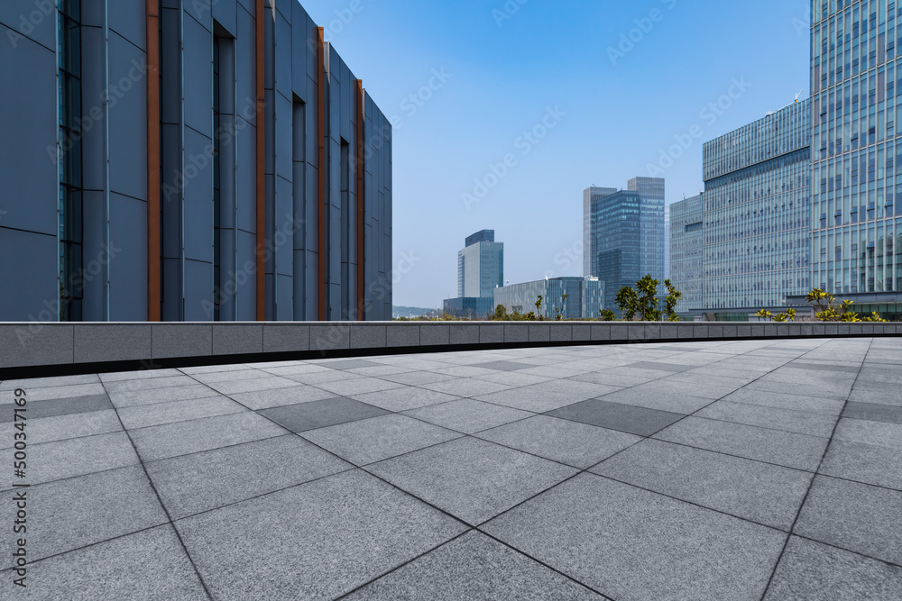 Fototapeta premium modern buildings and empty pavement in china.