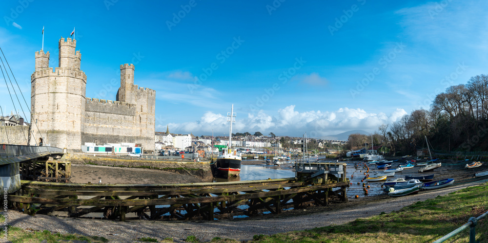 Panorama of Caernarfon Castle and River Seiont at low tide, ,North Wales,United Kingdom.