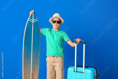 Young boy in summer hat and...