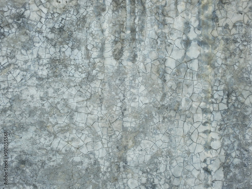 aged street gray concrete wall with crack, texture background