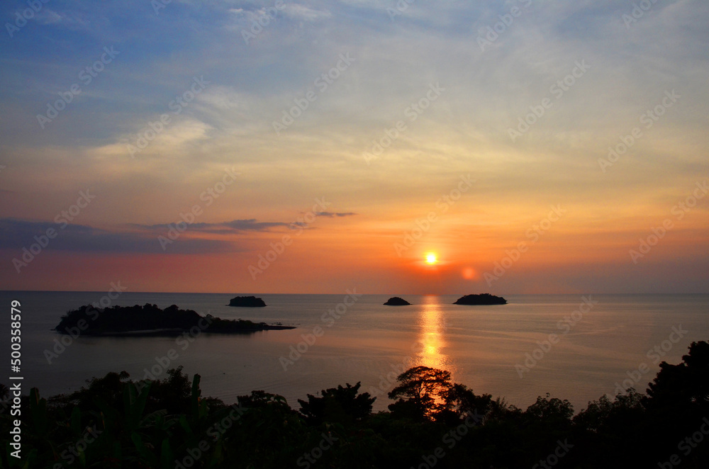 View landscape seascape and sky cloudscape in sea ocean gulf of thailand at sunset dusk time for thai people foreign traveler travel visit rest relax at viewpoint of Koh Chang island in Trat, Thailand