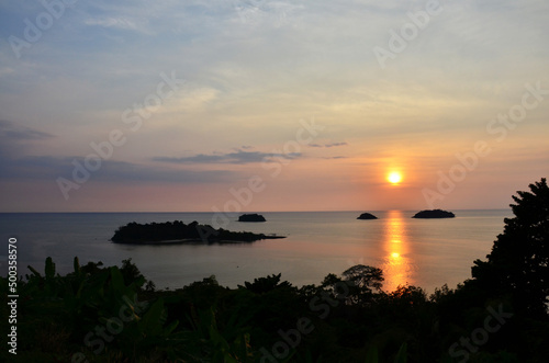 View landscape seascape and sky cloudscape in sea ocean gulf of thailand at sunset dusk time for thai people foreign traveler travel visit rest relax at viewpoint of Koh Chang island in Trat, Thailand