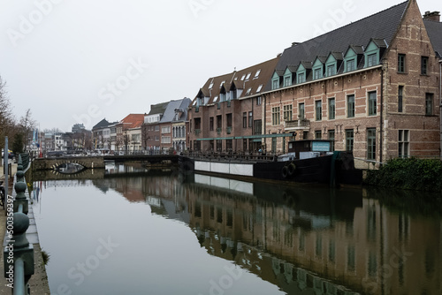 Architectural detail of the Haverwerf (oat yard), a street located at the banks of the river Dyle and an ancient trade market for oats in the city center of Mechelen, Belgium