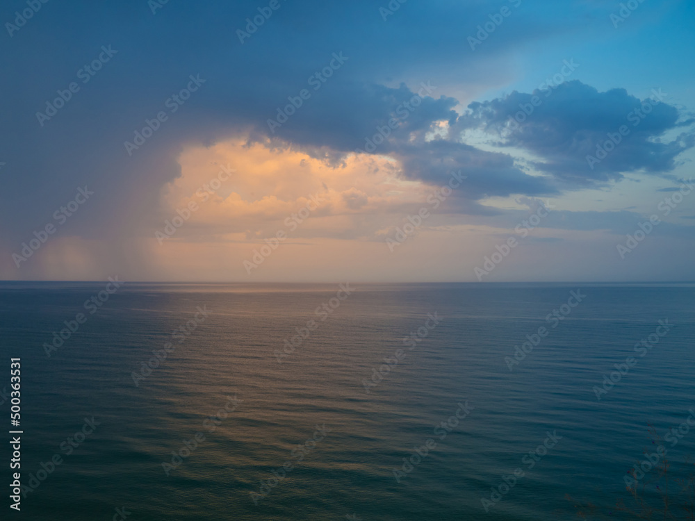 Morning landscape with cloudy sky and ripples at sea in Yemen. Beautiful colorful seascape. Wide deep blue sea ocean ripples. Nautical background