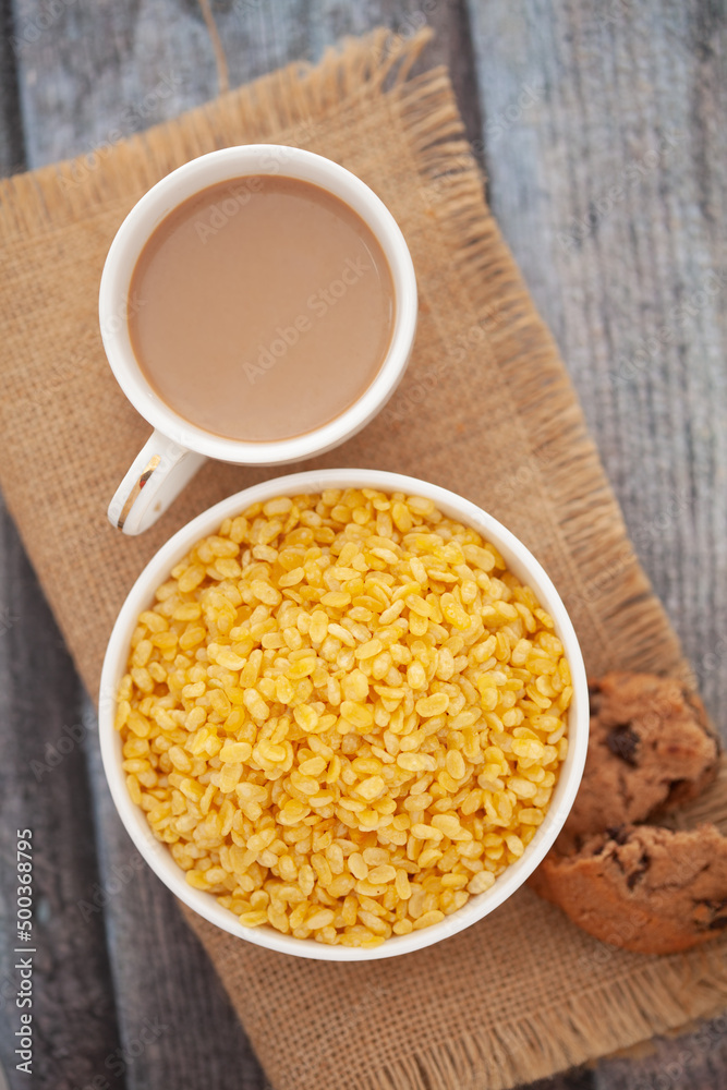 Close-Up of crunchy Indian mixture snacks with hot tea or Coffee time and handmade cookies (biscuits). Close-Up of crunchy Indian mixture snacks with hot tea or Coffee time and handmade cookies (biscuits).
