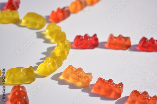 Jelly Bean.Confiture.Marmalade bear.Sugar.Pleasure. Marmalade bears on a white background in the shape of a sun photo