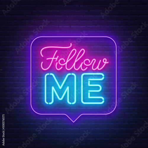 Follow me neon sign in the speech bubble on brick wall background.