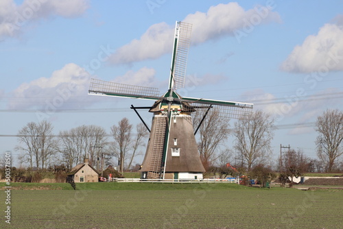 Windmill as working dry pumping of the Tweemanspolder, System named Molenviergang in Zevenhuizen photo