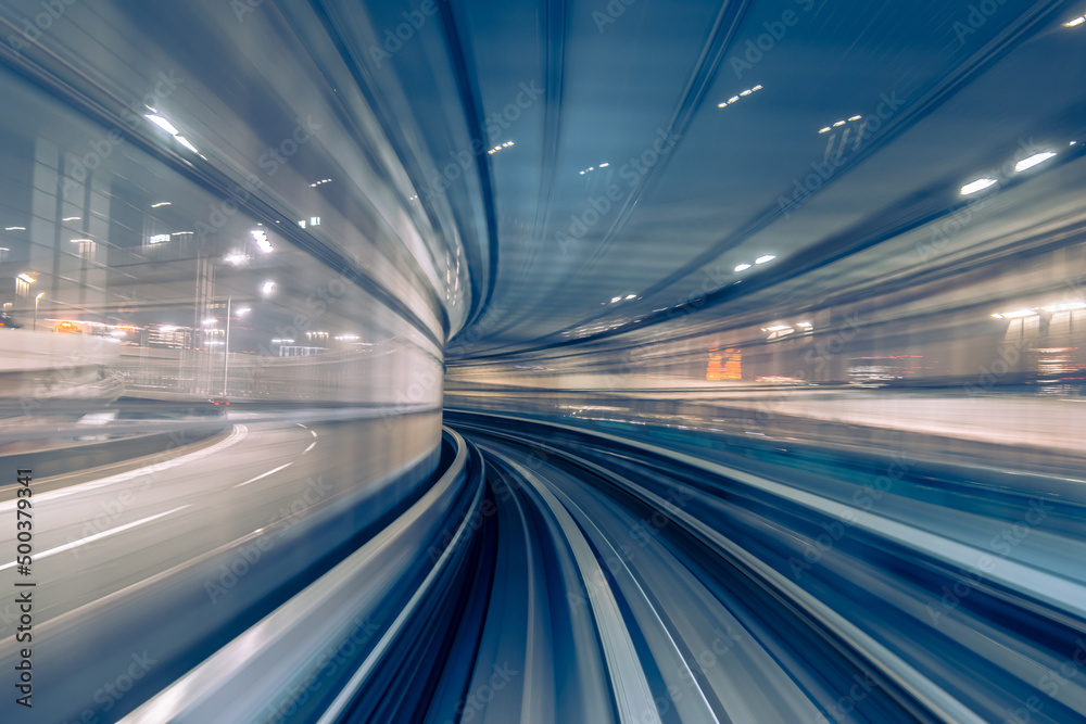 Long exposure motion blur from Yurikamome Monorail line in Tokyo, Japan. Abstract for Digital, Technology, Futuristic Transportation, Computer Network, and Communication concept.