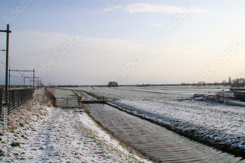 Railroad crossing around the Tweede Tochtweg in the Zuidplaspolder in Nieuwerkerk photo