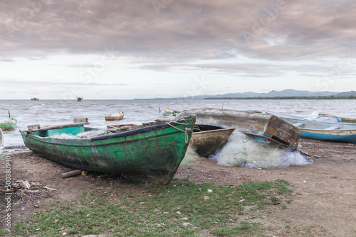 Fishing boats lay on the coast of Samana Bay