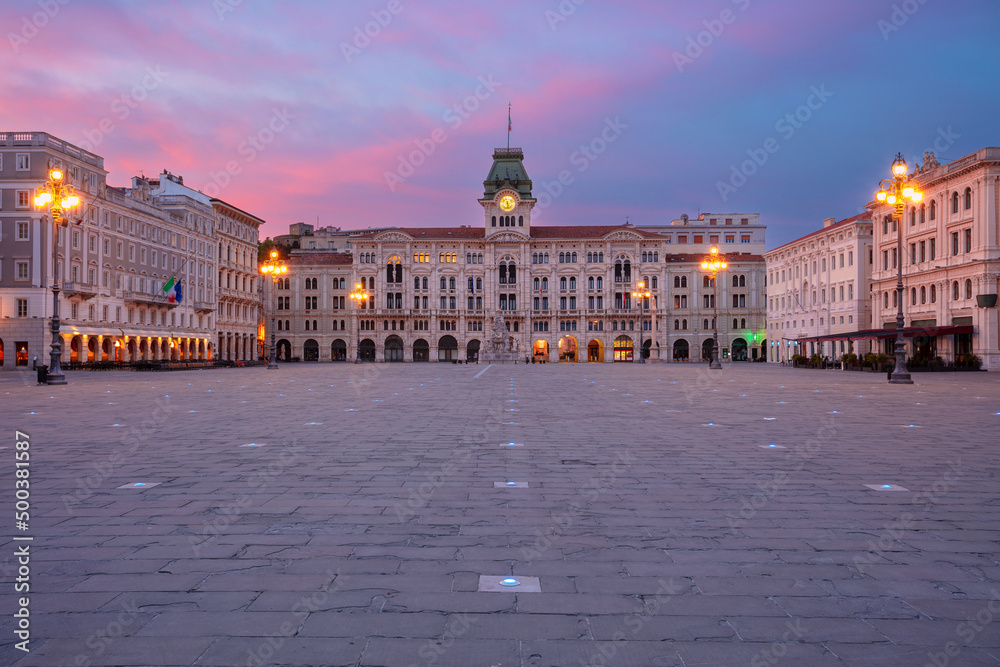 Trieste, Italy. Cityscape image of downtown Trieste, Italy with main square at dramatic sunrise.
