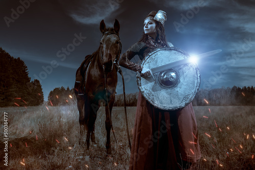 knight woman on battlefield photo