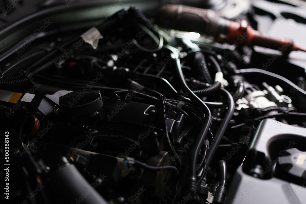 Fototapeta premium New car engine closeup. Powerful engine of modern car