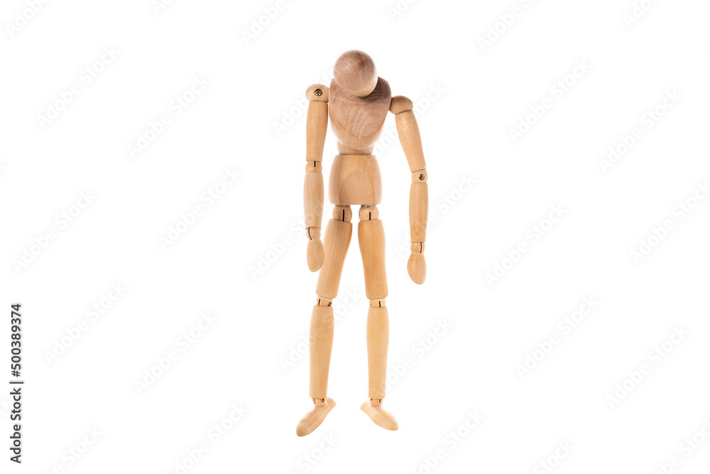 a wooden man stands sad with his head down isolated on a white background a wooden man stands sad with his head down isolated on a white background