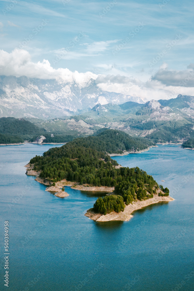 Aerial view landscape Karacaoren lake surrounded by mountains in Turkey. Forest island in turquoise water scenery wild nature travel beautiful destinations