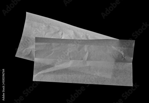 White blank rolling paper isolated on black  