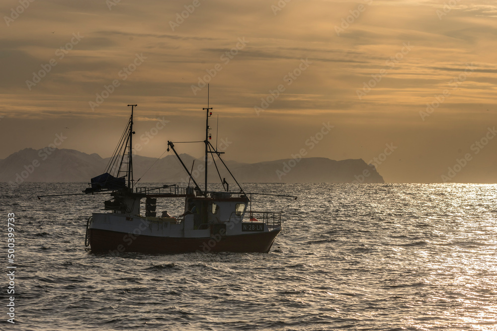 Norway mountains around the sea in the winter time