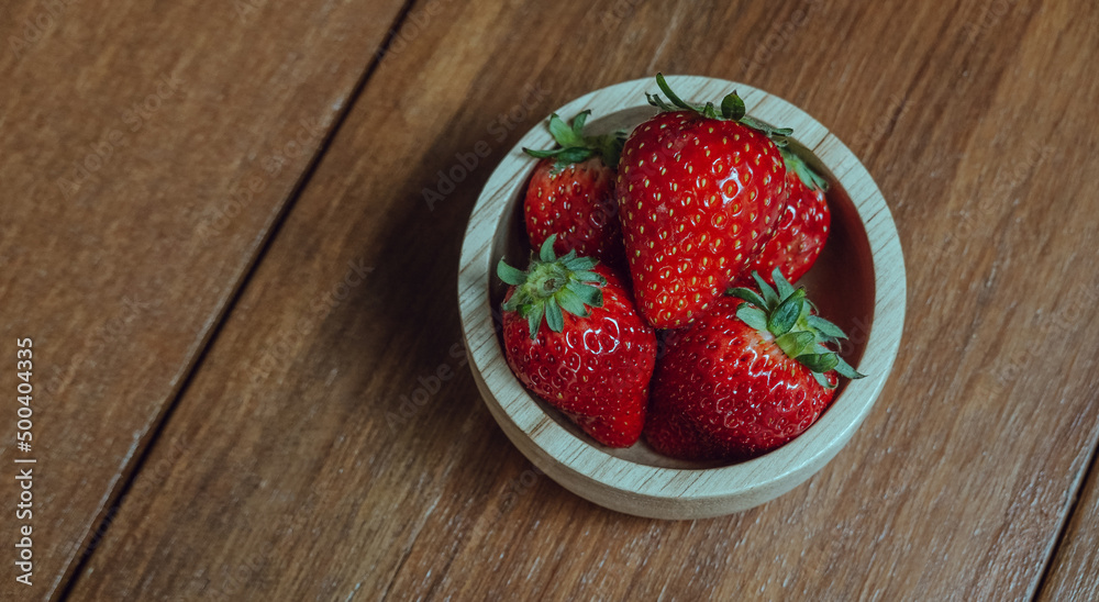 Fresh juicy premium strawberries on natural wooden background. Tochiotome Japanese strawberry. Fresh juicy premium strawberries on natural wooden background. Tochiotome Japanese strawberry.