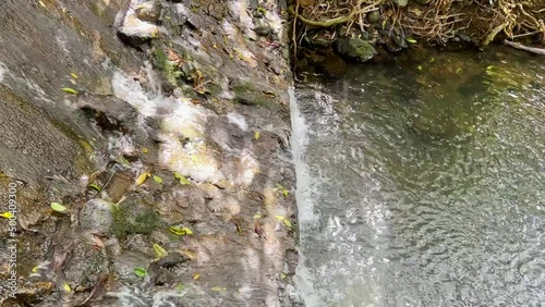 Hiking and mini waterfall in Hawaii.