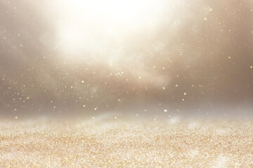 background of abstract gold and silver glitter lights. defocused