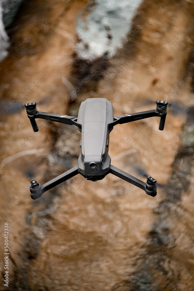 top view of drone quadrocopter flying in the air. top view of drone quadrocopter flying in the air.