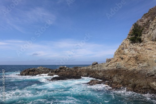 waves crashing on rocks