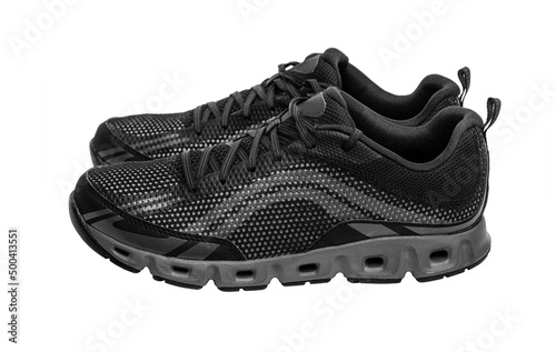 Sport shoes isolated on white background. Black sneakers running shoes.
