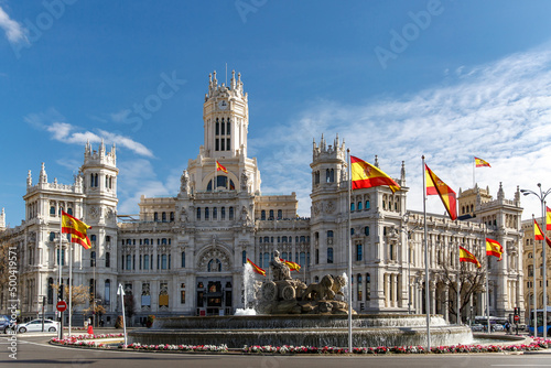 A lot of Spanish flags in Plaza Cibeles in Madrid, Spain. photo