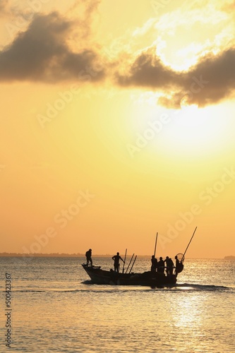 fishing boat at sunset