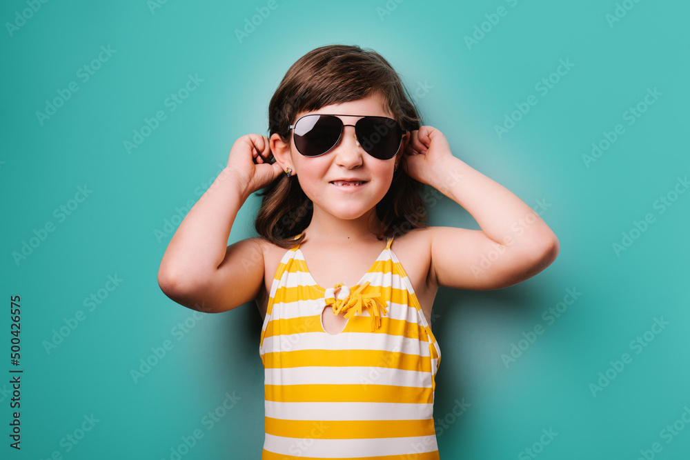 Trendy smiling girl in black sunglasses Stock Photo | Adobe Stock