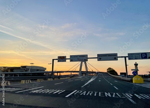 Milano, Italy, 12.04.2022. View of terminal 1 and bridge at Malpensa airport at sunrise.