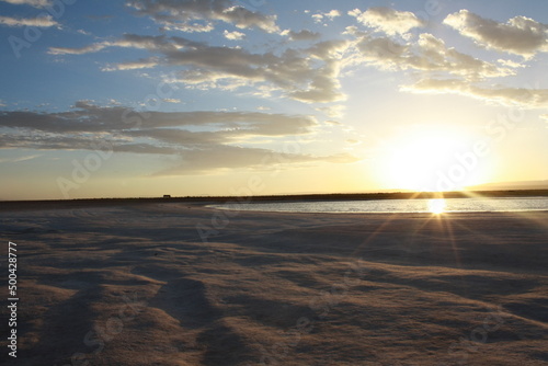 watching the sunset on the rock formation mountain in "Valle De La Luna" in the world famous Atacama desert in Chile