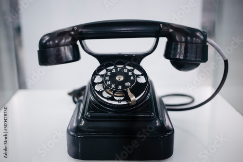 Canvas Print old retro black dial telephone with numbers and russian alphabet