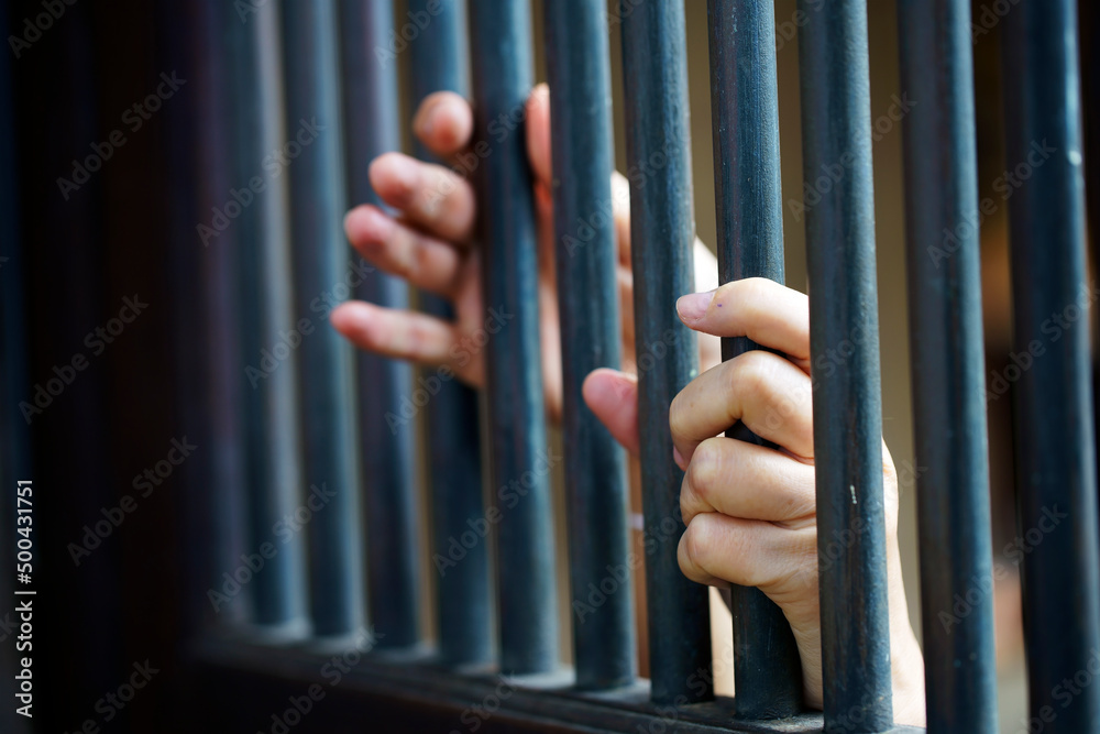 Obraz premium hand in jail