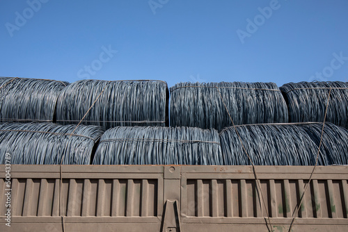 Bundles of steel bars piled up on the car