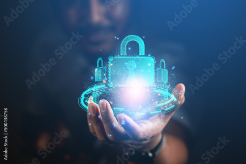 cybersecurity concept Business man shows how to protect cyber technology network from attack by hackers on the internet. Secure access to privacy through smartphones Meta protection.
 photo