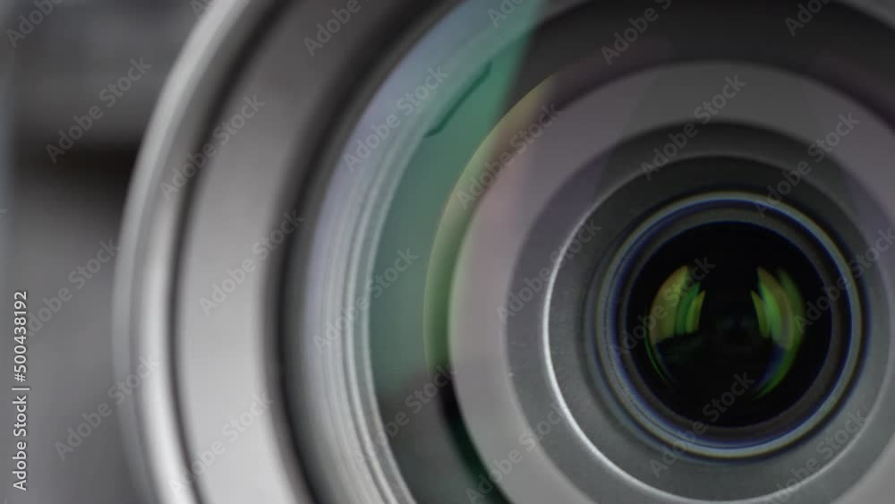 Macro Shot of Camera Lens with Flare on Optical Glass. Process of Zooming Camera Lens