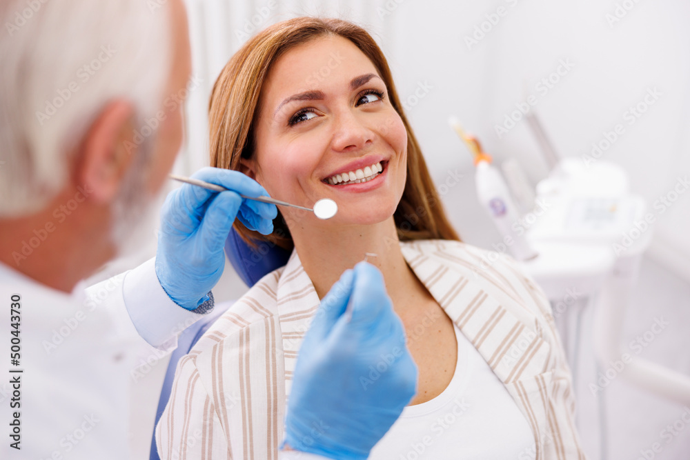 Woman at dental checkup at dentist office Woman at dental checkup at dentist office