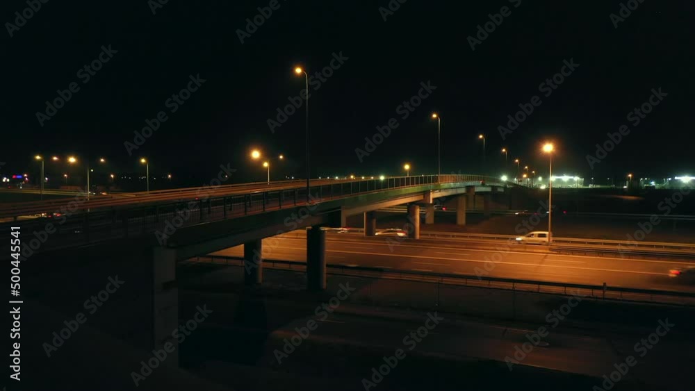 Aerial view of an expressway with little car traffic at night. Aerial view of an expressway with little car traffic at night.