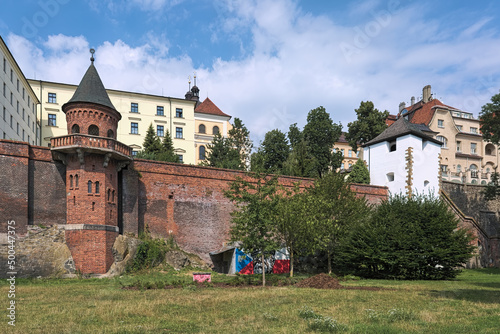 Olomouc, Czech Republic. Former city wall with towers and staircase in Bezruc gardens under Church of St. Michael. The church is visible in the background. The gardens named after poet Petr Bezruc. photo