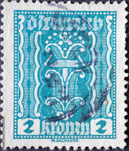 Austria - circa 1922: a postage stamp from Austria, showing a Symbolism: hammer and tongs
